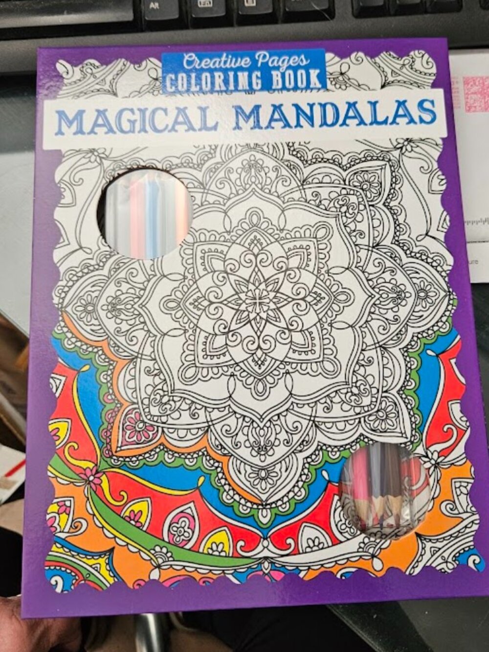 Magical Mandalas Coloring Book with Colored Pencils